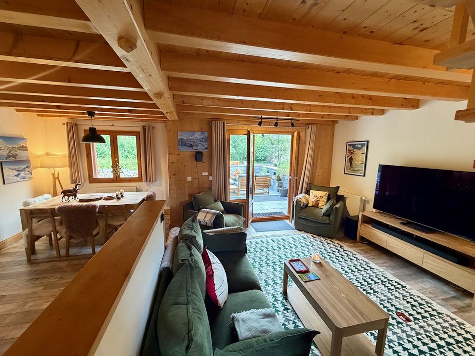 Looking down over the living floor from the attic staircase.