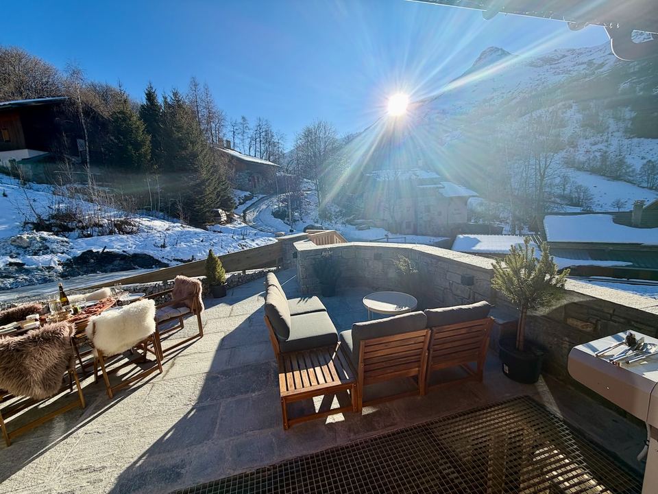 Sofas for four on the upper terrace, which holds the sun from breakfast to mid-afternoon.