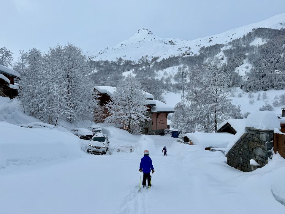 Skiing down to the lift after an overnight fall.